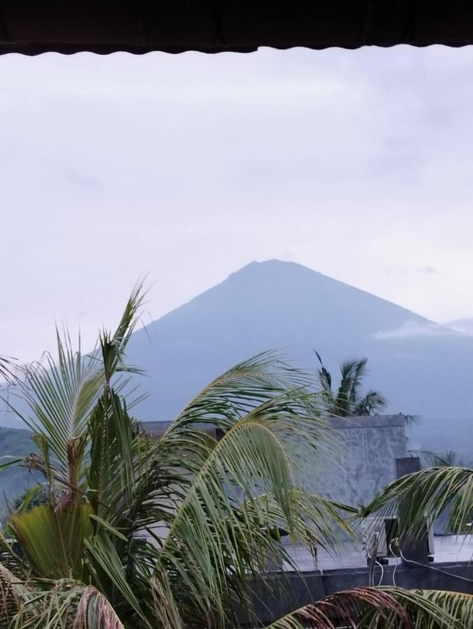 Amed Stop Inn Homestay, Rooftop Restaurant And Bar Exterior photo